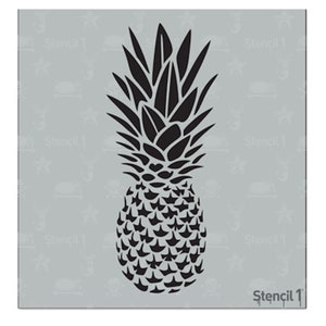 May include: Black pineapple stencil on a light gray background. The stencil features a detailed outline of a pineapple, including the spiky crown and textured body. The words "Stencil 1" are printed in the bottom right corner.