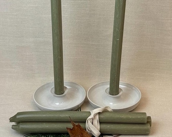 Ceramic candlesticks finished in soft white glaze