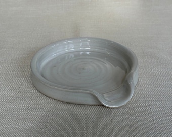 Hand thrown ceramic spoon rest in soft white glaze