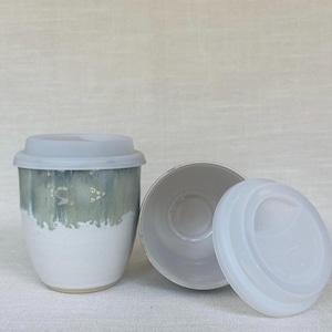Hand thrown ceramic travel cup / pottery travel mug / reusable coffee cup with lid in green volcano flow glaze
