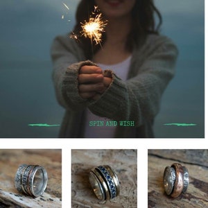 May include: Three silver spinning rings with different designs. The ring on the left has a copper band and a floral design. The middle ring has a blue sapphire band. The ring on the right has a copper band and a hammered texture. The rings are on a wooden surface. "Spin and Wish" is written in green text on a white background.