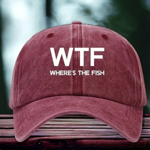 May include: A maroon baseball cap with a white embroidered design that says "WTF WHERE'S THE FISH".