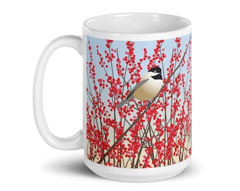 May include: White ceramic mug with a black-capped chickadee perched on a branch with red berries against a blue sky background.