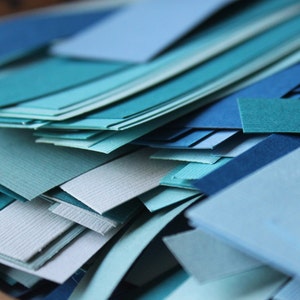 Large Box of Blue Paper Scraps image 1