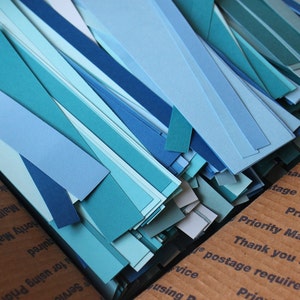 Large Box of Blue Paper Scraps image 4