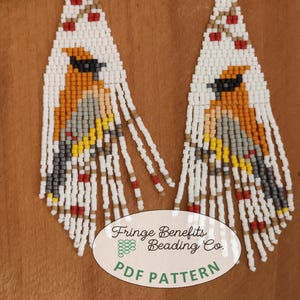 May include: A pair of beaded earrings with a white background and a colorful bird design. The earrings are long and have a fringe at the bottom. The earrings are labeled "Fringe Benefits Beading Co. PDF Pattern".