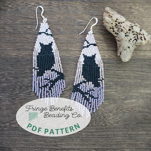 May include: A pair of long, triangular beaded earrings featuring a black cat silhouette against a gradient background of white, gray, and lavender beads. The earrings have silver-toned metal hooks and a fringe bottom. Text reads: Fringe Benefits Beading Co. PDF PATTERN.