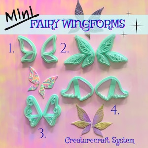 May include: An assortment of miniature fairy wing forms in various designs and colors, including light green and multicolored options. The image features the text "Mini FAIRY WINGFORMS" and "Creaturecraft System".