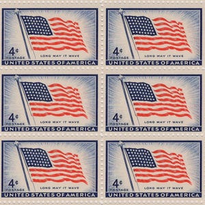 May include: Sheet of vintage 4-cent postage stamps. Each stamp features the American flag waving on a pole, with a blue field of stars and red and white stripes. Text includes "Long May It Wave" and "United States of America."
