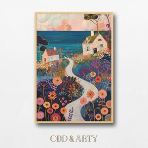 May include: A framed art print featuring a whimsical landscape with two cottages, a winding path, and colorful flowers. The artwork has a light wood frame and the text "ODD & ARTY" at the bottom.