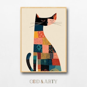 May include: A framed art print of a stylized cat illustration. The cat has a black head and tail, with a body made of colourful patchwork squares in various patterns. The text "ODD & ARTY" is at the bottom.