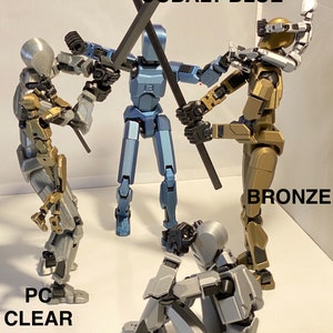 May include: Four articulated action figures, each in a different color: cobalt blue, bronze, silver, and clear black. The cobalt blue figure holds a black sword, the bronze figure holds a black sword, and the silver figure is sitting down. The clear black figure is standing with its arms raised.