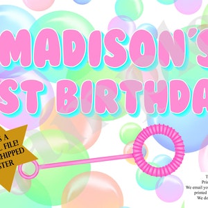 May include: A digital printable file for a 1st birthday party. The design features a pink bubble theme with the name "MADISON'S 1ST BIRTHDAY" in large pink letters. A gold star with the text "THIS IS A DIGITAL FILE! NOT A SHIPPED POSTER" is in the lower left corner.