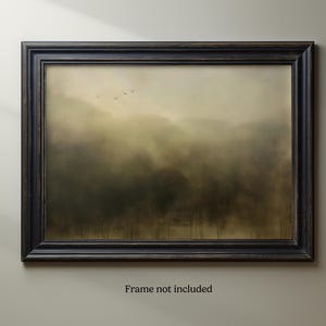 May include: A framed abstract landscape painting with a muted green and brown color scheme. The painting depicts a misty forest scene with a few birds flying in the distance.