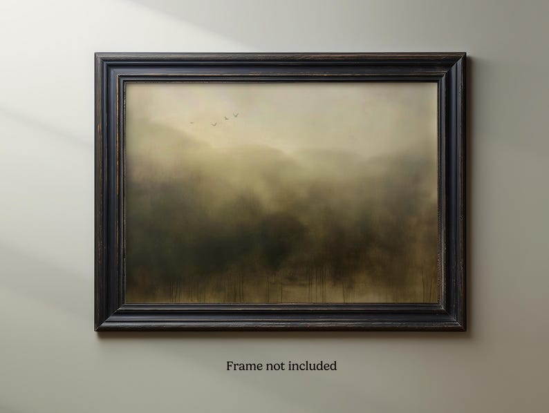 May include: A framed abstract landscape painting with a muted green and brown color scheme. The painting depicts a misty forest scene with a few birds flying in the distance.