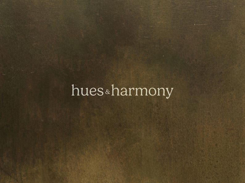 May include: A textured, dark brown background with the text "hues & harmony" in white.