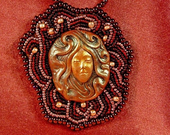 Swirling Brown Hair Woman Bead Embroiderd Polymer Clay Face Beaded Necklace