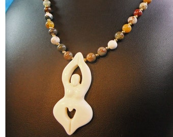 Carved White Bone Goddess Pendant on a Multicolored Stone Beaded Necklace