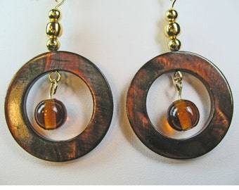 Swinging Brown Shell Donut Dangle Earrings with Brown Glass Beads Inside