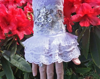 Steampunk Layered White Lace Cuff Silvery Pewter Charms Goddess Lock Key Wing Train Perfect for a Fantasy Sci Fi Wedding