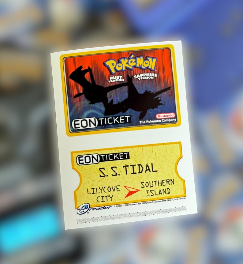 May include: A yellow and white Eon Ticket for the Pokemon Ruby and Sapphire video games. The ticket is for the S.S. Tidal, which travels from Lilycove City to Southern Island.