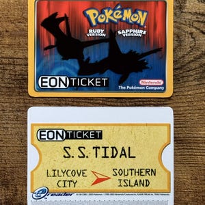 May include: A yellow and white Eon Ticket for the Pokemon Ruby and Sapphire video games. The ticket is for the S.S. Tidal, which travels from Lilycove City to Southern Island.