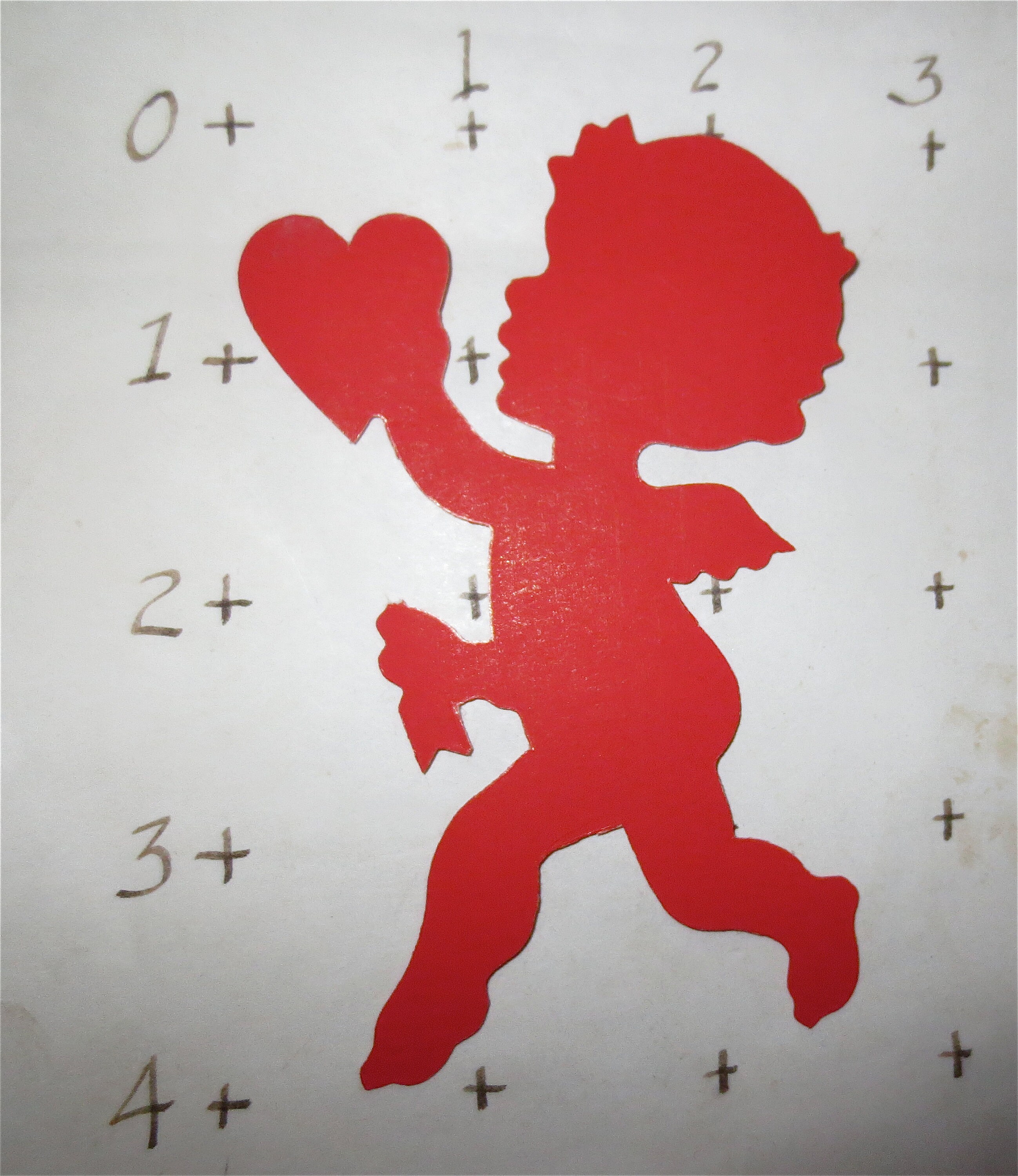 A vintage Valentines Day card with a cupid fishing a heart, Stock