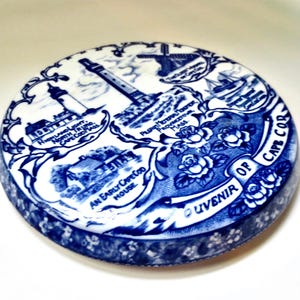 May include: A set of three ceramic mugs with a speckled, matte finish. The mugs are in shades of cream, light gray, and dark gray. Each mug has a simple, minimalist design, perfect for coffee or tea.