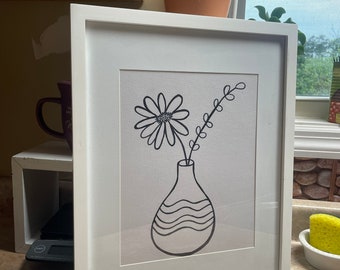 Floral sketch in white frame