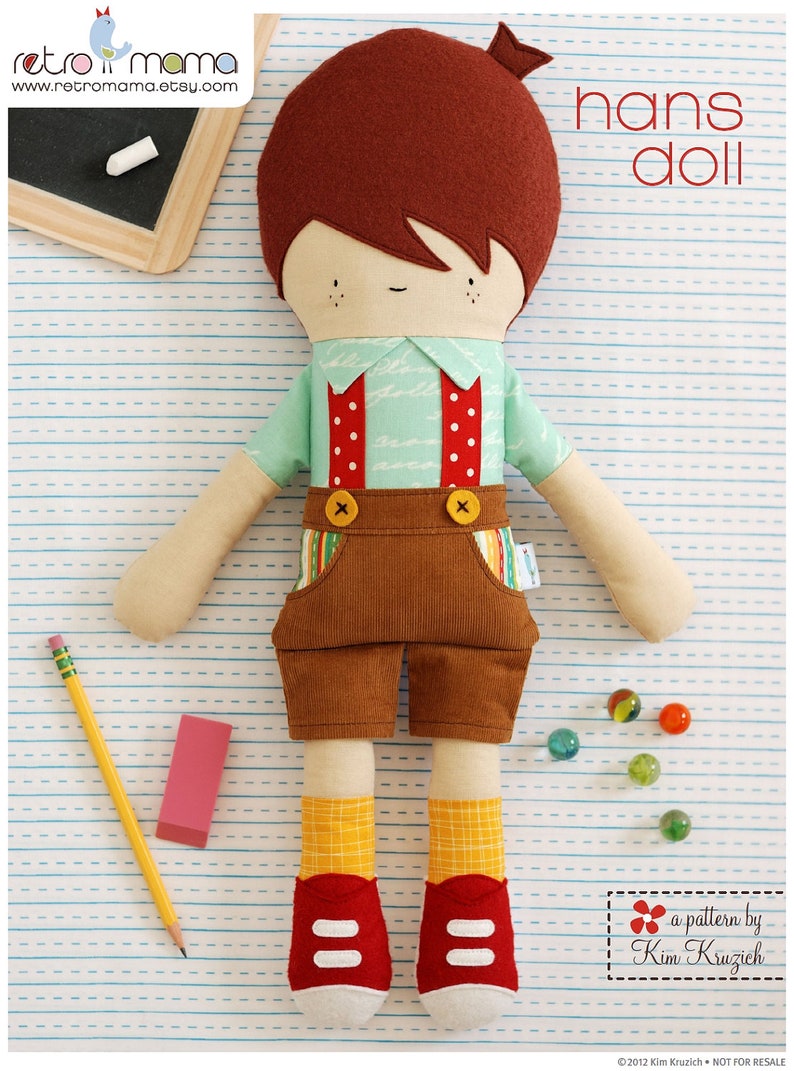 Hans from Retromama is a handsome boy doll wearing cute overalls.