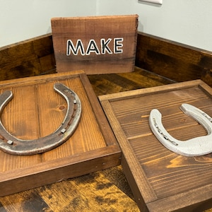 Horseshoe in a handmade frame for home or barn decoration