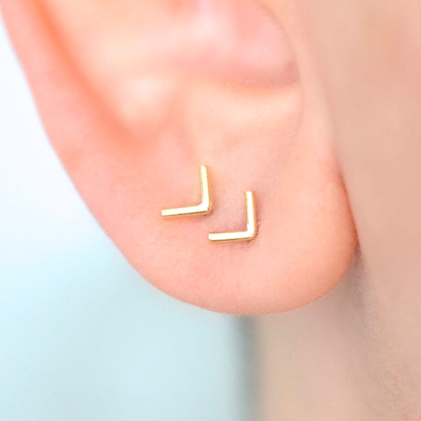 Chevron stud earrings made of brass and sterling silver