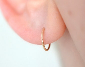 Dainty solid 14k yellow gold sleeper hoop earrings for earlobe or cartilage