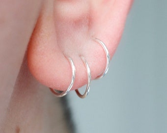 Minimalist sleeper hoop earrings for men or women in sterling silver for earlobe or cartilage