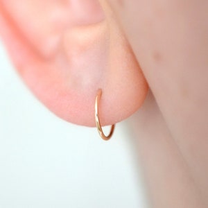 Dainty non allergic solid 14k yellow gold 9mm inner diameter sleeper hoop earrings for earlobe or cartilage