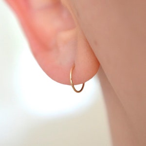 Dainty non allergic solid 14k yellow gold 9mm inner diameter sleeper hoop earrings for earlobe or cartilage image 5