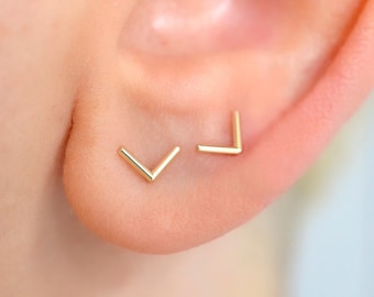 Solid 14k yellow gold dainty chevron stud earrings for minimalist men or women with sensitive ears and everyday wear