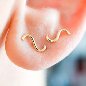 Memphis inspired wavy squiggle in solid 14k yellow gold stud earrings for minimalist men and women with sensitive ears image 1