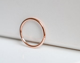 Solid 14k rose gold sleeper hoop huggie earrings for minimalist men or women with sensitive ears