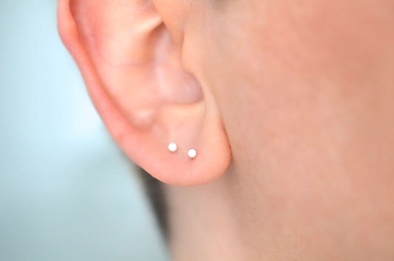 Pair of 2mm circle dot stud earrings in solid sterling silver for minimalist men or women snake bite ear piercing image 3