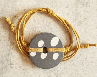 Adjustable bracelet with handmade porcelain bead