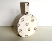 small porcelain vase with underglaze decoration and bright gold luster