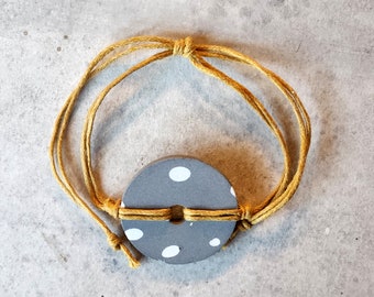 Adjustable bracelet with handmade porcelain bead