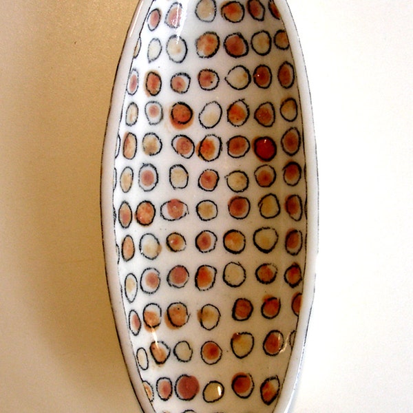 small elliptical porcelain bowl with underglaze drawing