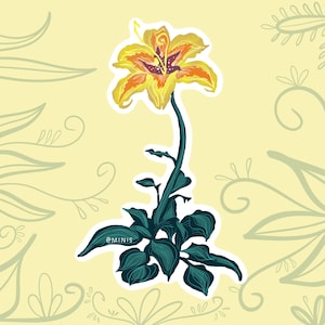 May include: A sticker featuring a yellow and orange lily with green leaves. The lily has a dark orange center and is drawn in a stylized, whimsical style. The sticker is on a light yellow background with a green floral pattern.