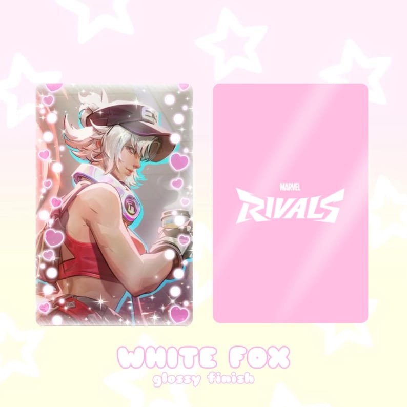 May include: A glossy card featuring a character illustration with a white and red color scheme. The card's front displays a character with white hair and a visor, while the back has the "Marvel Rivals" logo on a pink background. The text "WHITE FOX" and "glossy finish" are at the bottom.