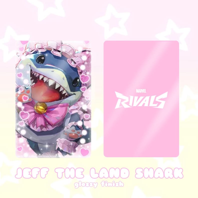 May include: A pink and white card featuring a cartoon shark character with a pink bow and frilly collar. The card on the right has the Marvel Rivals logo. Text at the bottom reads "JEFF THE LAND SHARK" and "glossy finish".