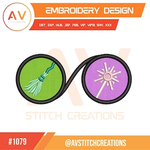 May include: An embroidery design featuring a green witch's broom and a pink starburst wand, connected by a black line. The design is set against a white background with the text "EMBROIDERY DESIGN" and "AV STITCH CREATIONS".