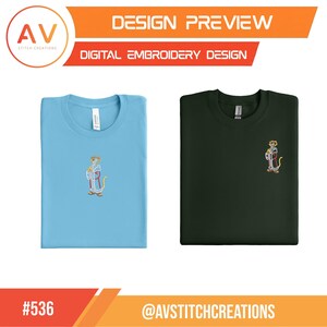 May include: Two t-shirts, one light blue and one dark green, each with an embroidered design of a cartoon character. The light blue shirt has a round neck, and the dark green shirt has a crew neck. The top of the image reads "DESIGN PREVIEW" and "DIGITAL EMBROIDERY DESIGN".