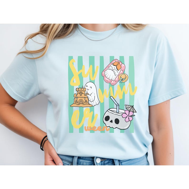 Cute Summerween ghost shirt design with striped background, ghost building sandcastle, ghost on float, skull coconut drink and tropical spooky summer aesthetic